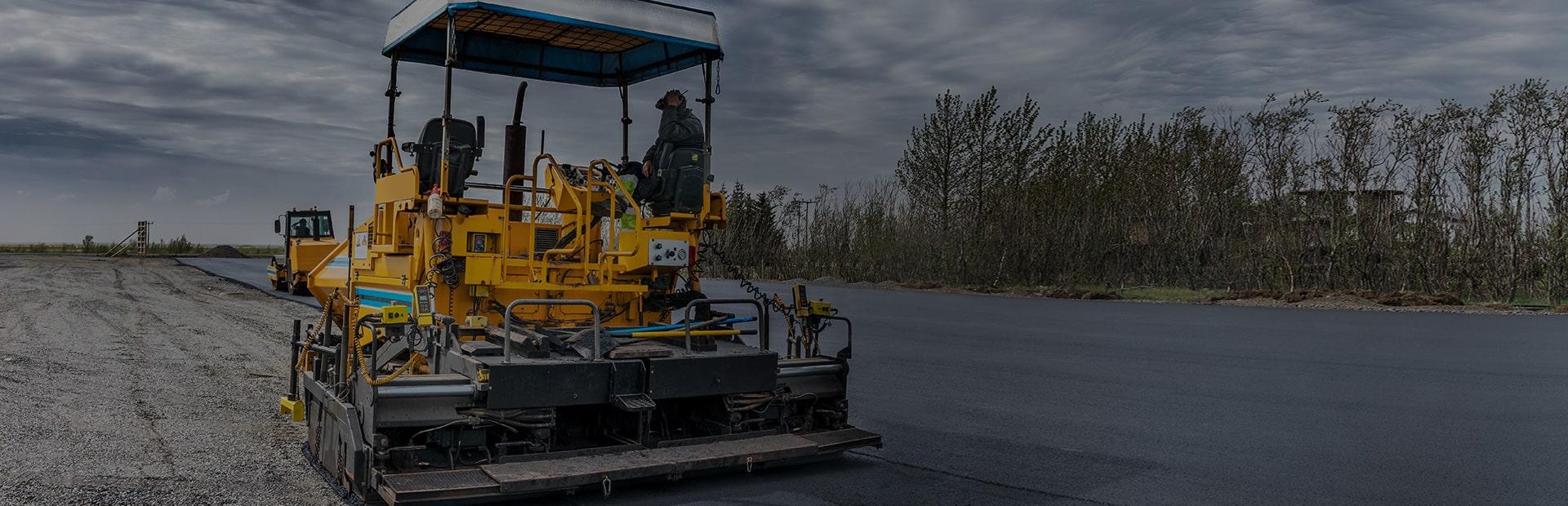 Maszyna budowlana do wylewania asfaltu Slajd 1